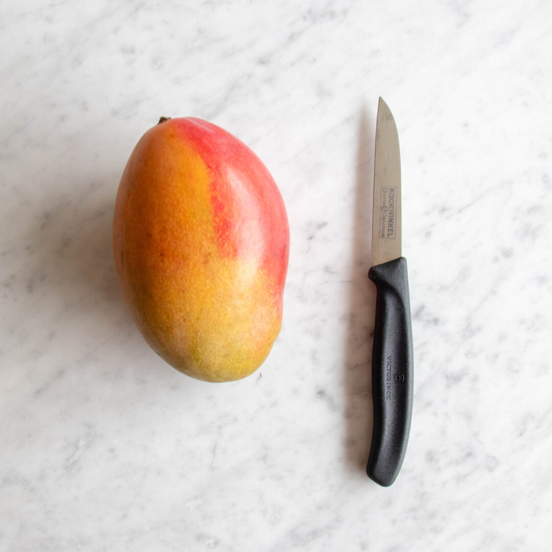 How to grow a mango from the seed inside the pit tutorial, mango and a knife