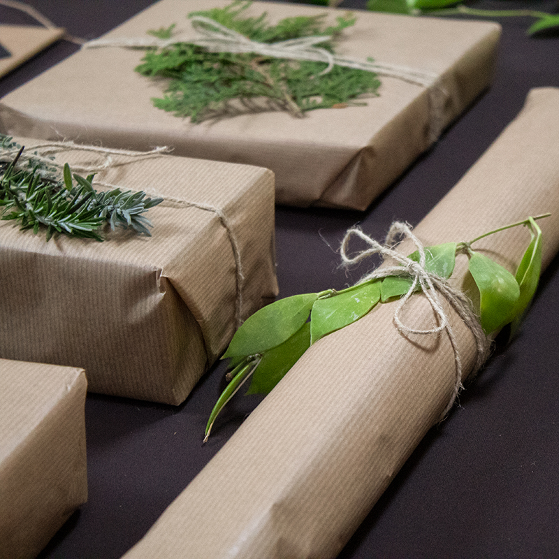Eco-friendly gift wrapping ideas with plants and rope