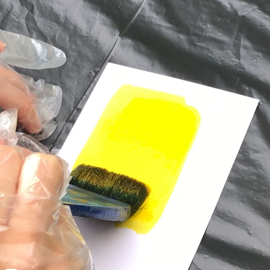 Coating paper with turmeric mix