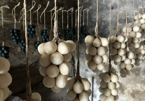 bunches of grape soaps drying in the sun in the Lebanese workshop