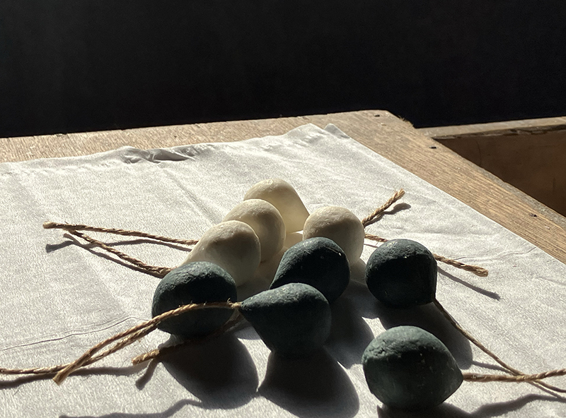 individual soap grapes black and creme colors before making bunch of grapes soap