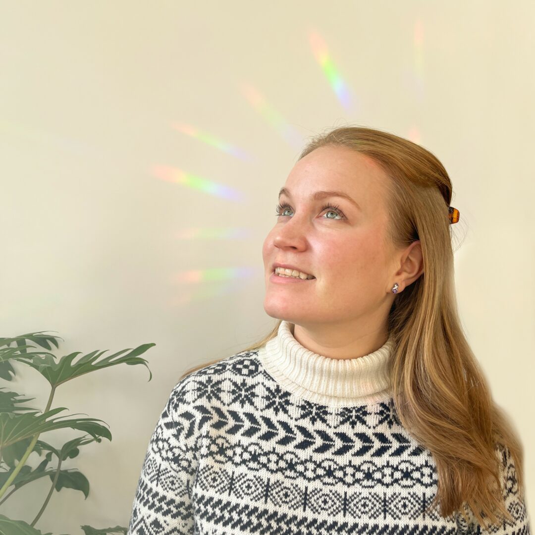 person with rainbow around her thanks to the rainbow sticker