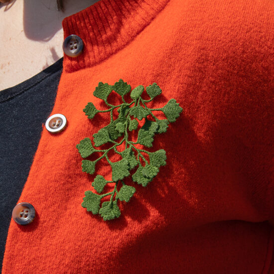 Maidenhair fern embroidered brooch on shirt